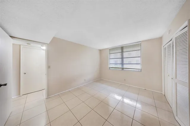 a view of an empty room with window