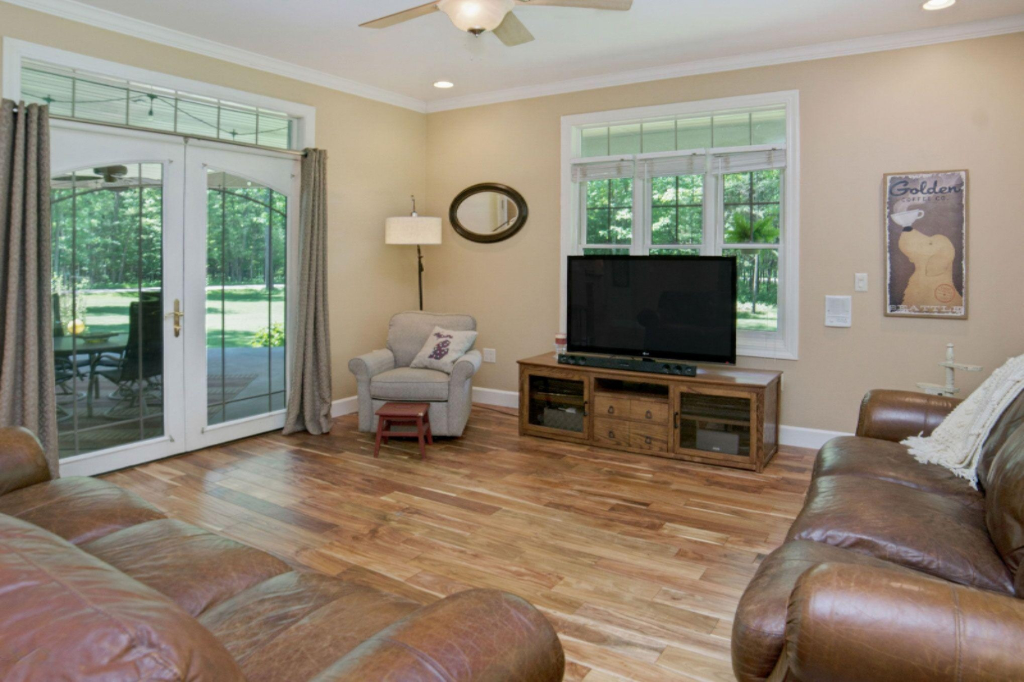 2978 Little River Road Manistee, MI 49660 - Photo 16 of 71 Main Living Room with Walk Out to Wrap A