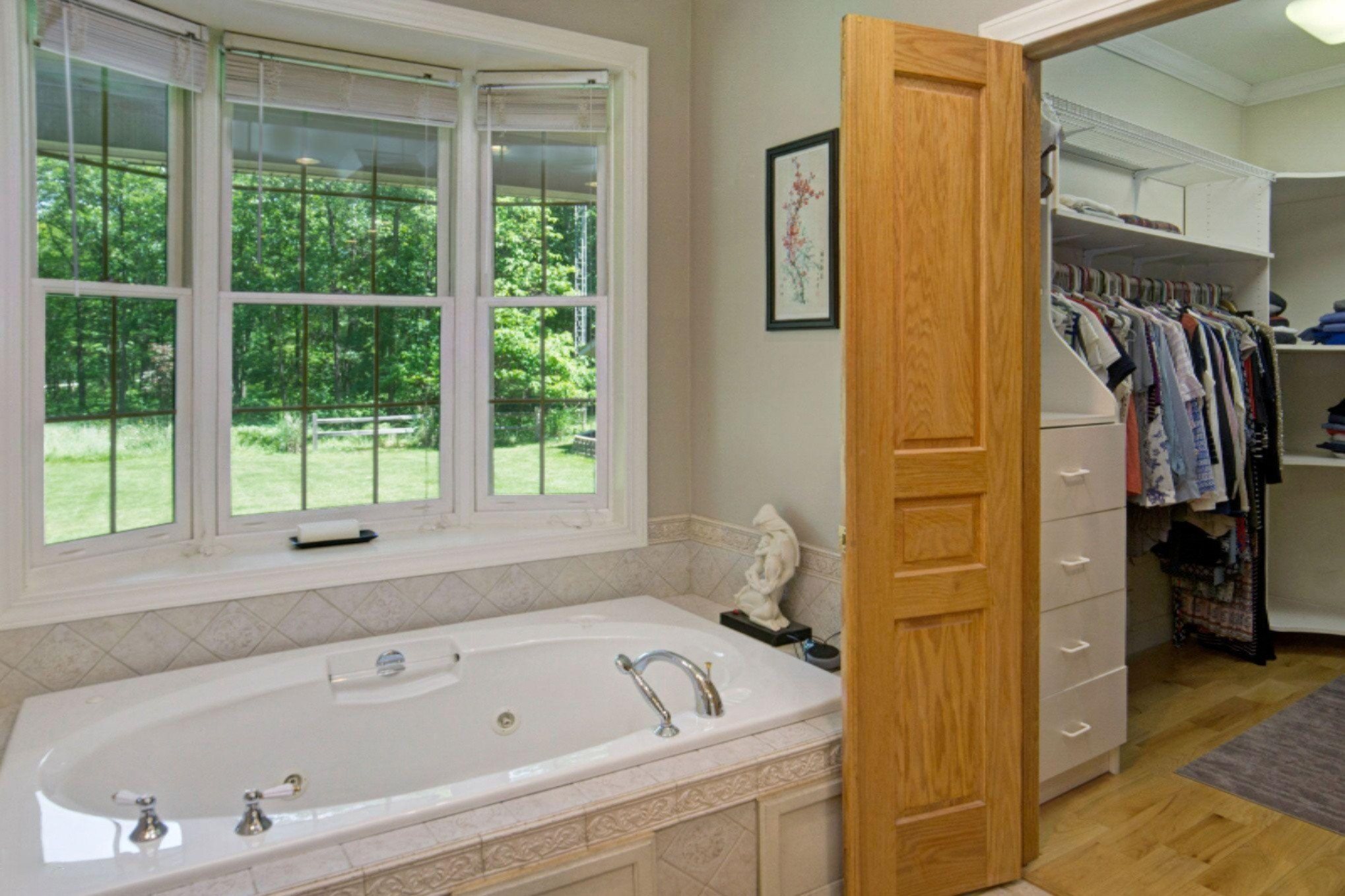 2978 Little River Road Manistee, MI 49660 - Photo 21 of 71 Main Master Bahtroom with Walk In Closet
