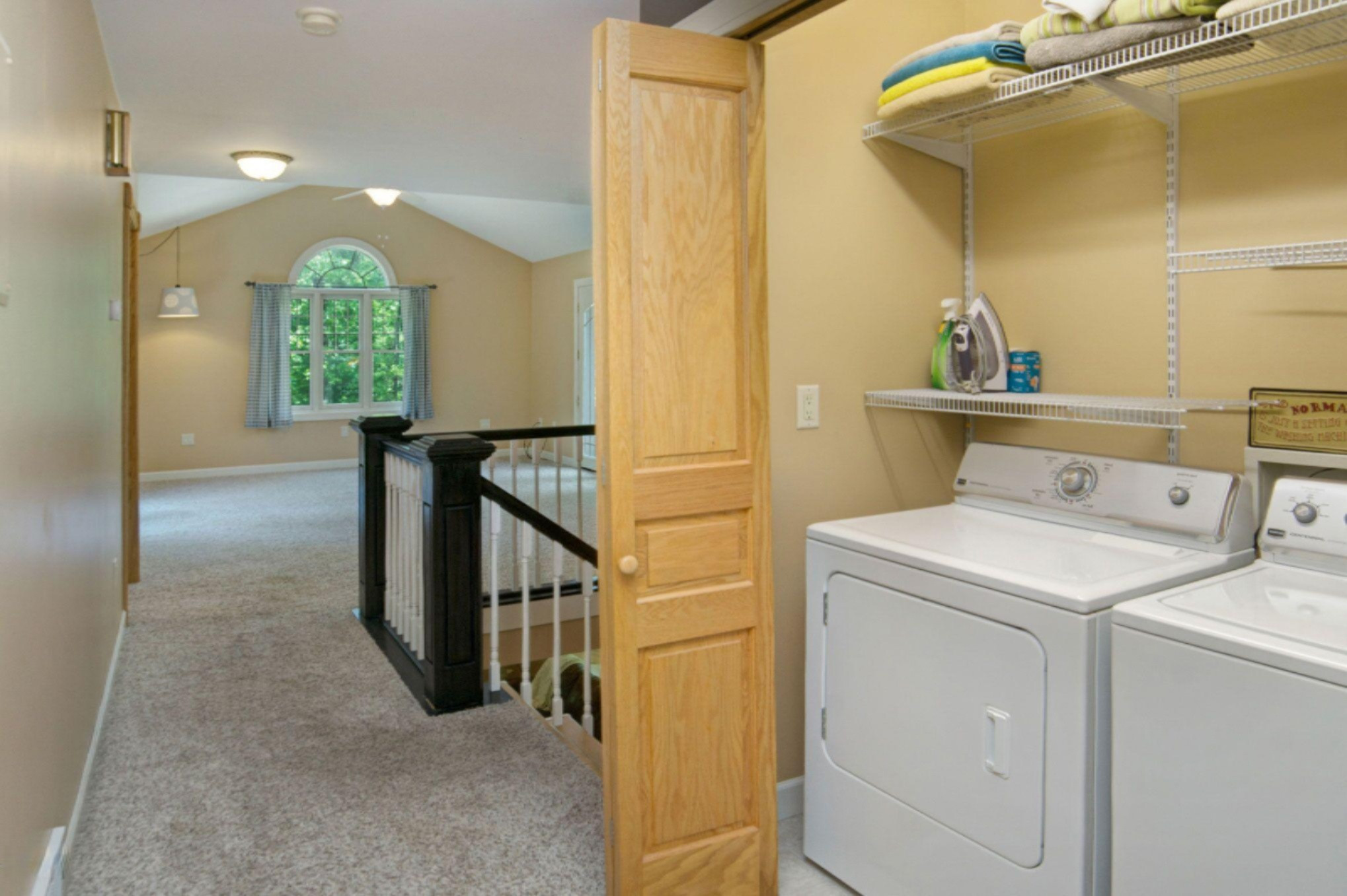 2978 Little River Road Manistee, MI 49660 - Photo 35 of 71 Upper Laundry and Family Room