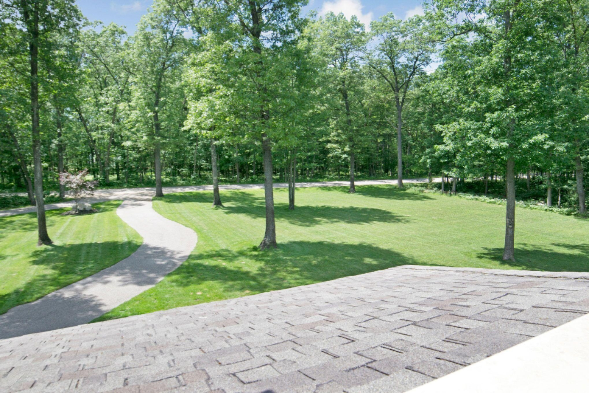 2978 Little River Road Manistee, MI 49660 - Photo 40 of 71 Paved Driveway and Road