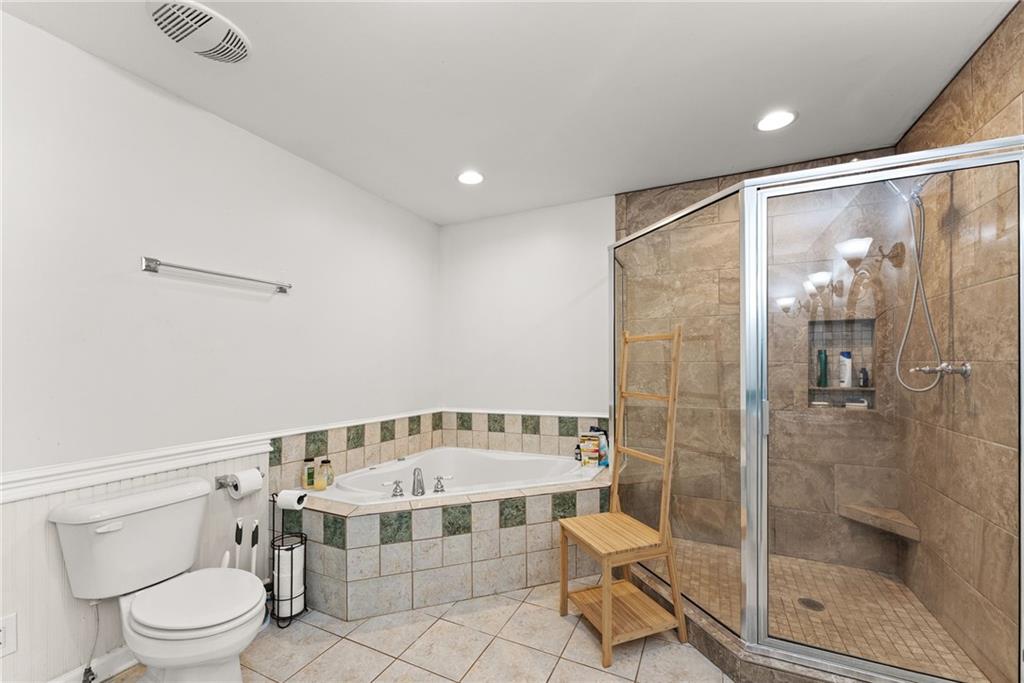 290 Chastain Road Sautee Nacoochee, GA 30571 - Photo 22 of 69 a bathroom with a bathtub and a toilet