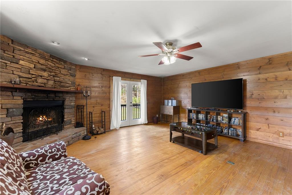 290 Chastain Road Sautee Nacoochee, GA 30571 - Photo 30 of 69 a living room with furniture and a fireplace