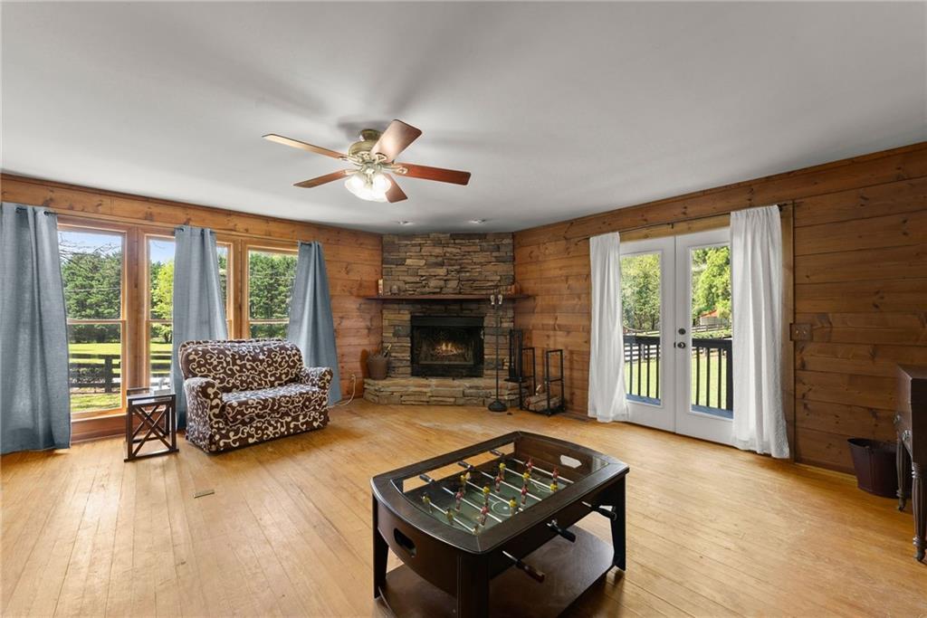290 Chastain Road Sautee Nacoochee, GA 30571 - Photo 32 of 69 a living room with furniture and a fireplace