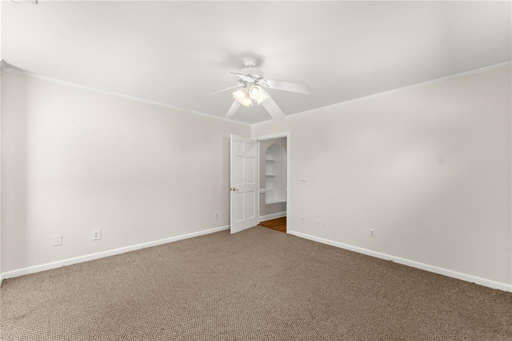 290 Chastain Road Sautee Nacoochee, GA 30571 - Photo 34 of 69 an empty room with a fan and a ceiling fan