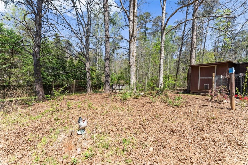 290 Chastain Road Sautee Nacoochee, GA 30571 - Photo 53 of 69 a view of house with yard and sitting area