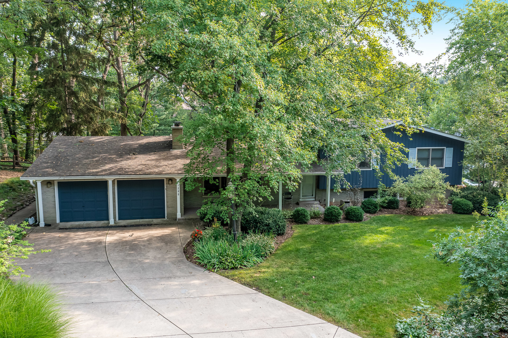 1200 Oak Hill Road Downers Grove, IL 60515 - Photo 1 of 24 a house view with a garden space