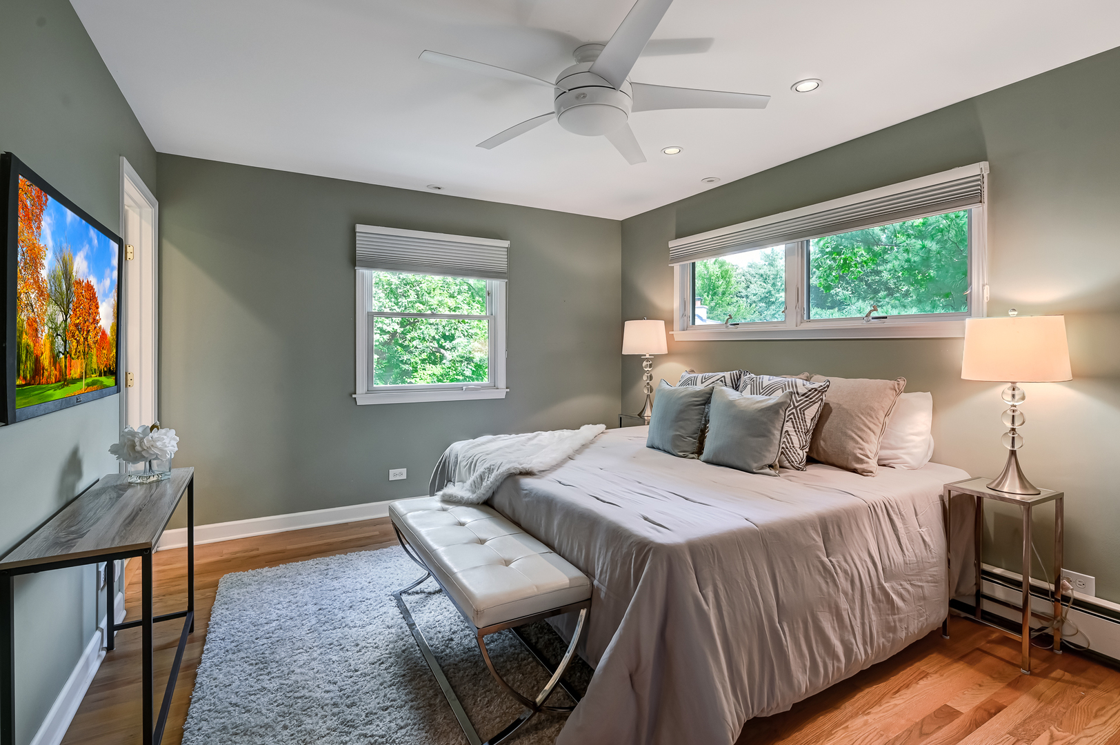 1200 Oak Hill Road Downers Grove, IL 60515 - Photo 12 of 24 a bedroom with a bed and a flat screen tv