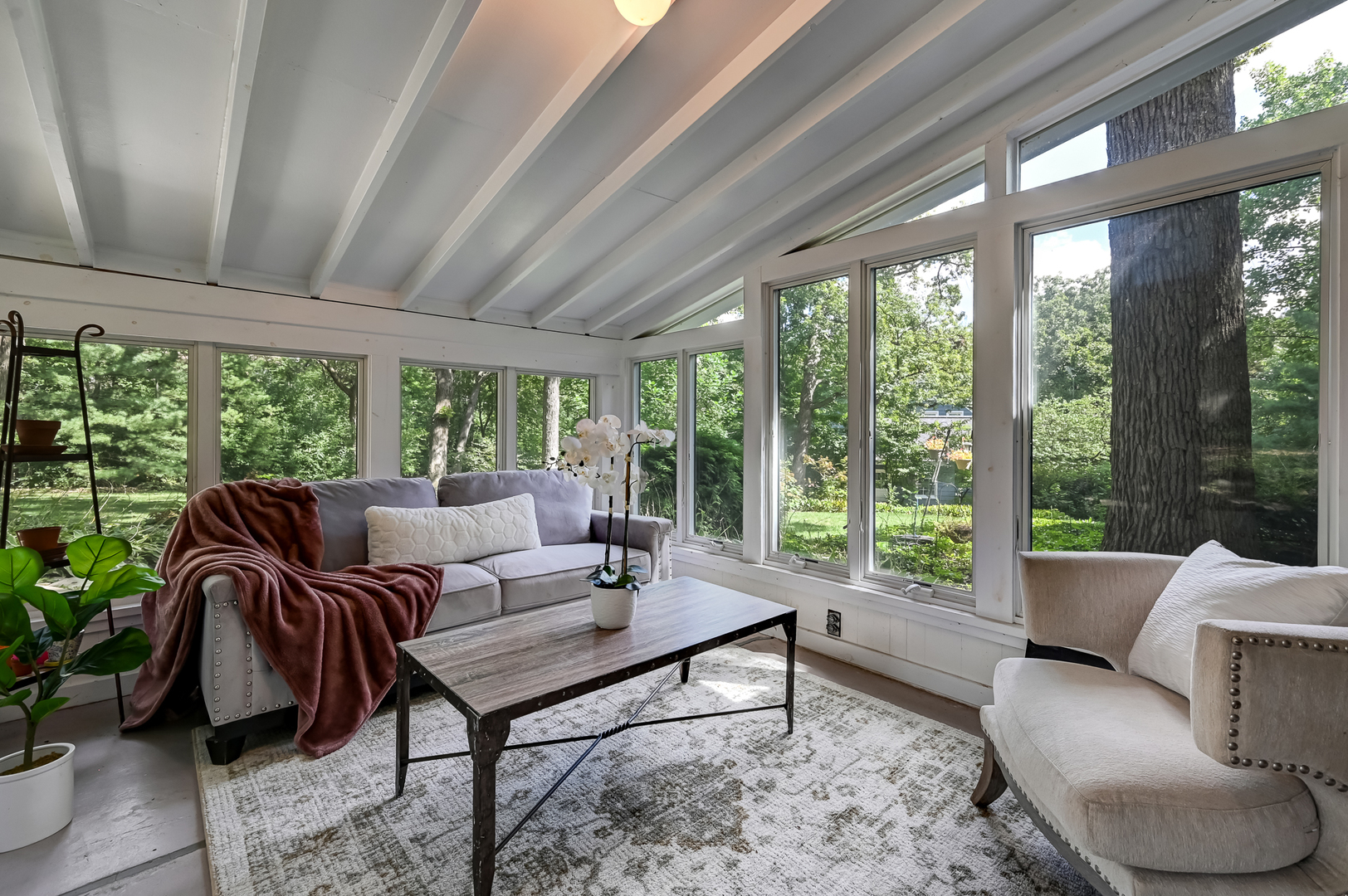 1200 Oak Hill Road Downers Grove, IL 60515 - Photo 10 of 24 a living room with furniture and a large window