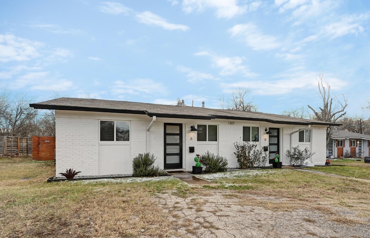 1307 Falcon Cove, Unit A Austin, TX 78745 - Photo 1 of 21 Ranch-style home with brick siding