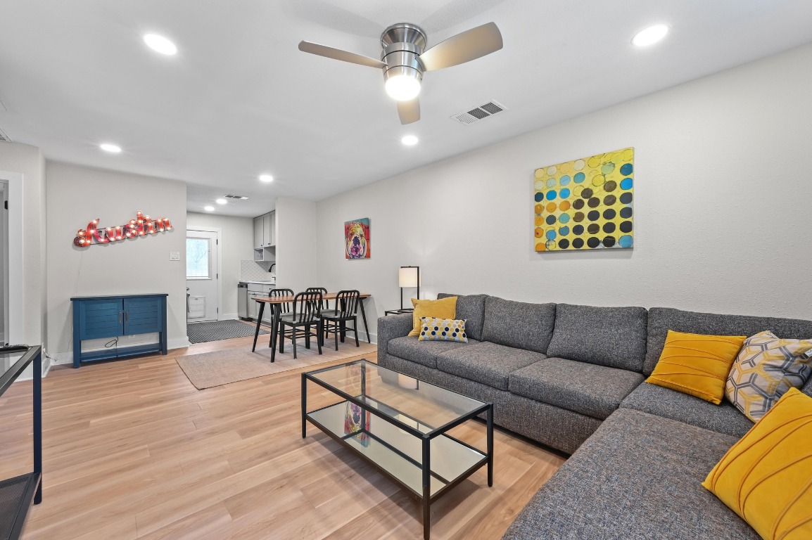1307 Falcon Cove, Unit A Austin, TX 78745 - Photo 5 of 21 Living room featuring light wood-style flooring, recessed lighting, and a ceiling fan