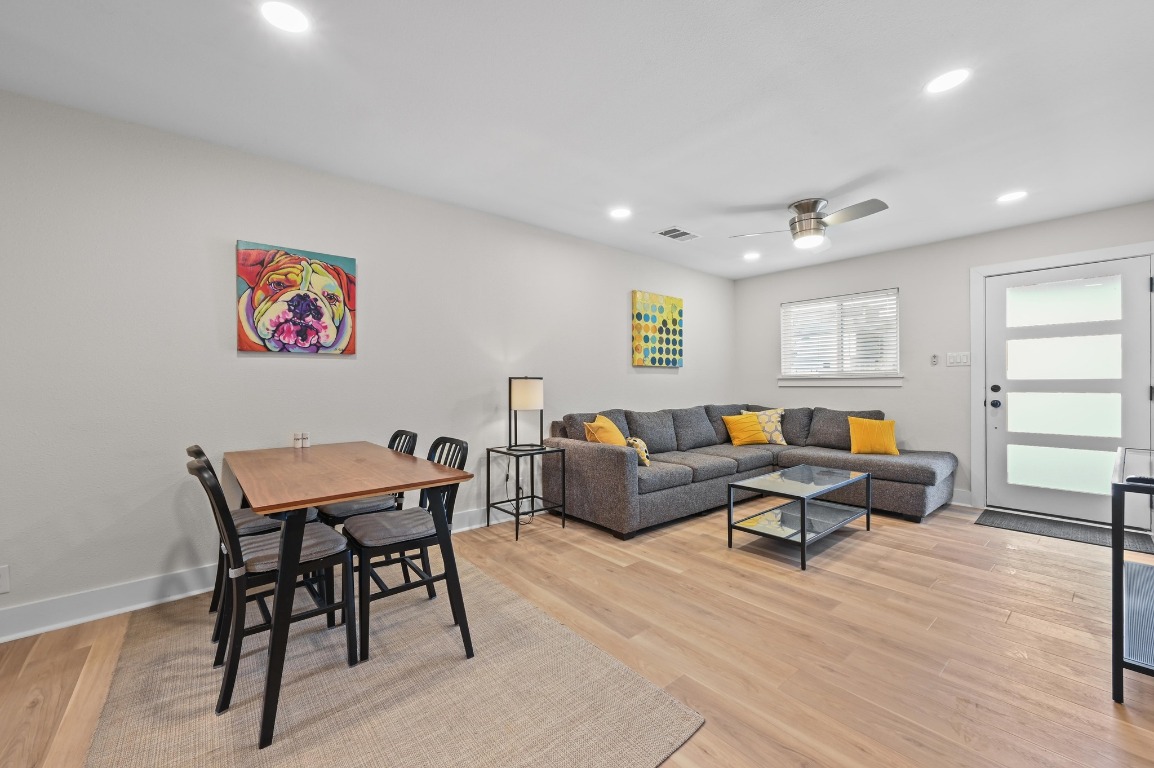 1307 Falcon Cove, Unit A Austin, TX 78745 - Photo 10 of 21 Living room with light wood-type flooring, recessed lighting, and ceiling fan