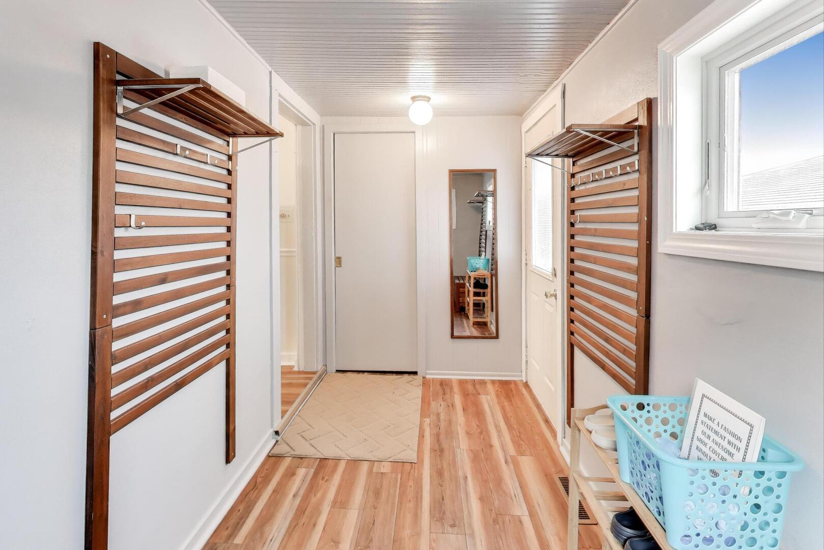 2643 Ridge Road Lansing, IL 60438 - Photo 13 of 30 a view of a hallway with wooden floor and staircase
