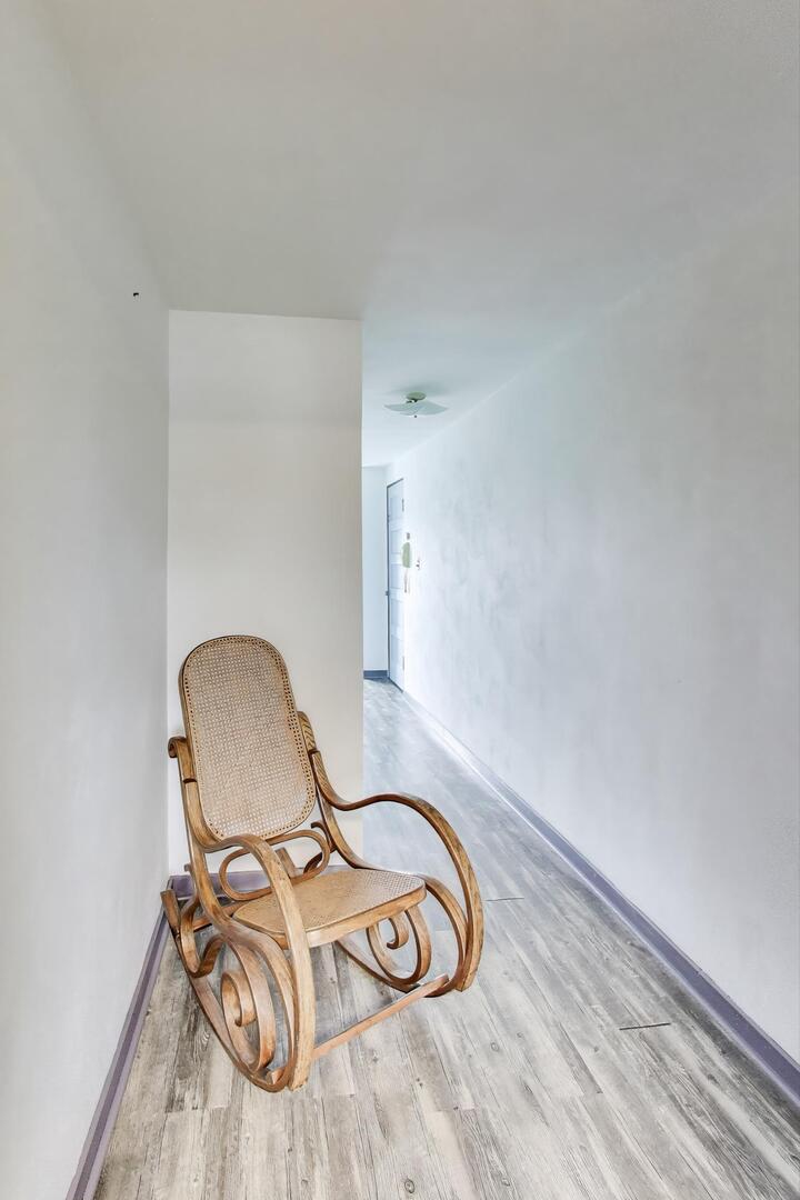 2643 Ridge Road Lansing, IL 60438 - Photo 16 of 30 a room with wooden floor and chairs