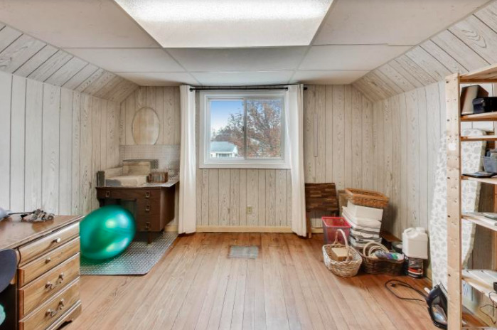 2643 Ridge Road Lansing, IL 60438 - Photo 17 of 30 a view of a room with gym equipment and wooden floor