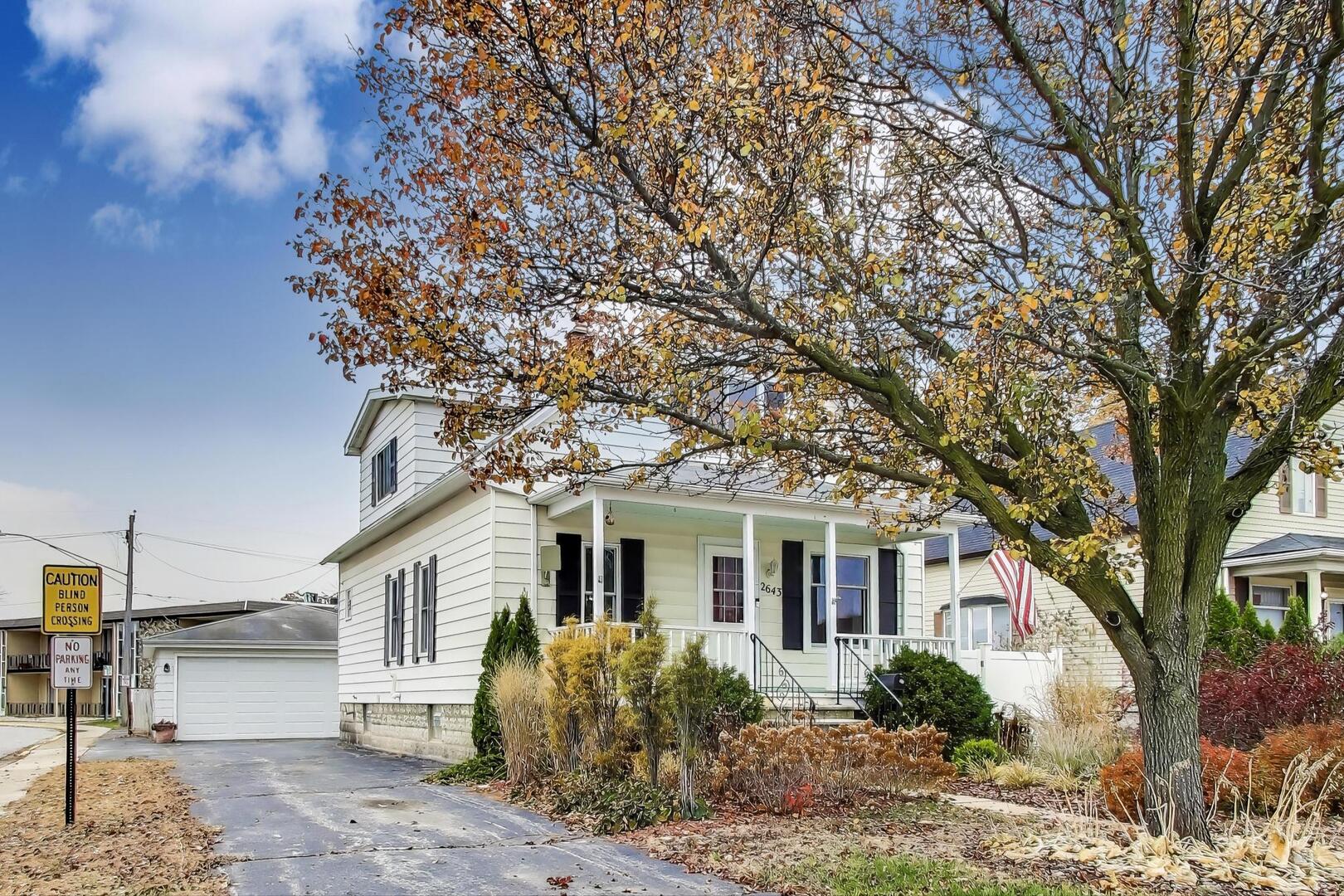 2643 Ridge Road Lansing, IL 60438 - Photo 2 of 30 a front view of a house with garden
