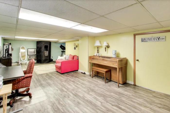 2643 Ridge Road Lansing, IL 60438 - Photo 21 of 30 a room with furniture and a fireplace