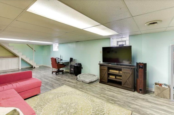 2643 Ridge Road Lansing, IL 60438 - Photo 23 of 30 a living room with furniture and a flat screen tv
