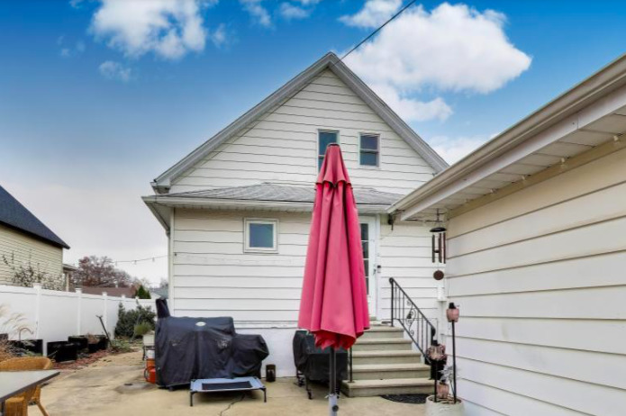 2643 Ridge Road Lansing, IL 60438 - Photo 26 of 30 a front view of a house with a chair