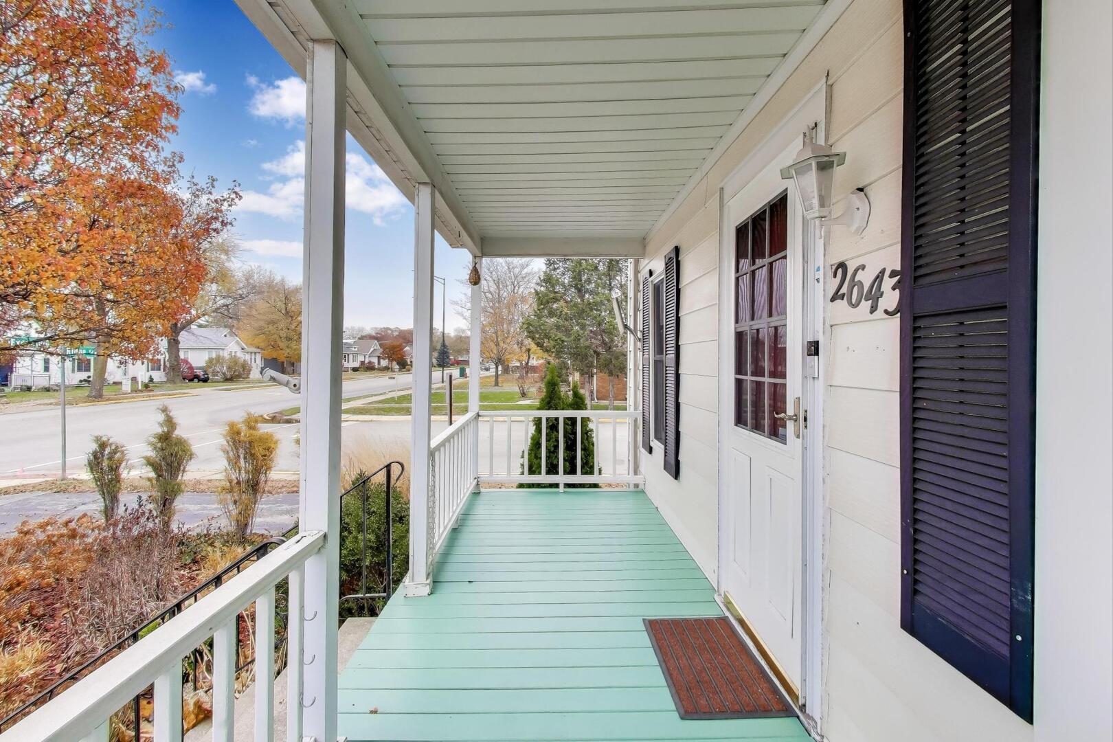 2643 Ridge Road Lansing, IL 60438 - Photo 4 of 30 a view of a balcony with wooden floor