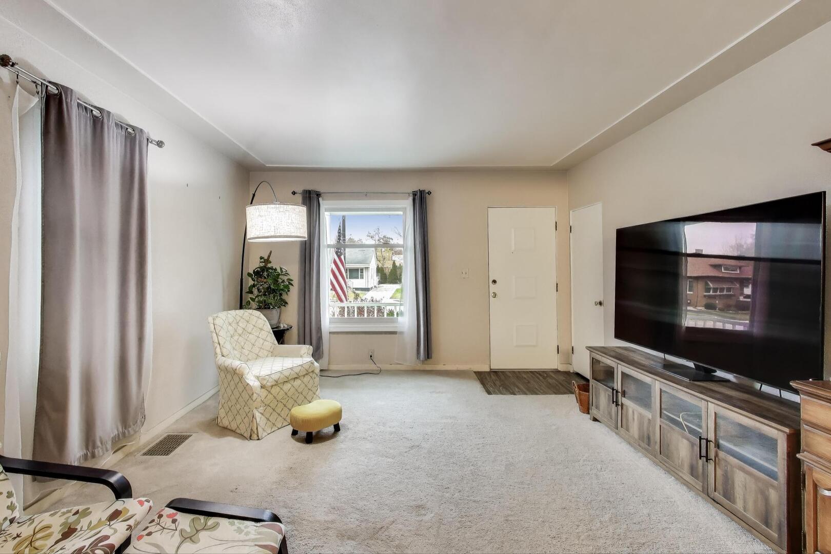 2643 Ridge Road Lansing, IL 60438 - Photo 5 of 30 a living room with furniture and a flat screen tv