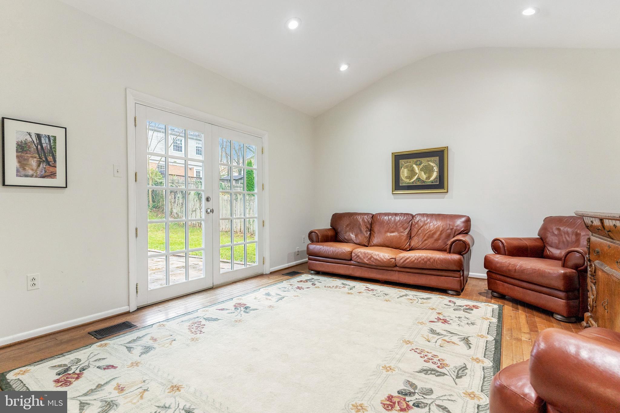 11810 Milbern Drive Potomac, MD 20854 - Photo 16 of 36 Family room with French doors to fenced backyard