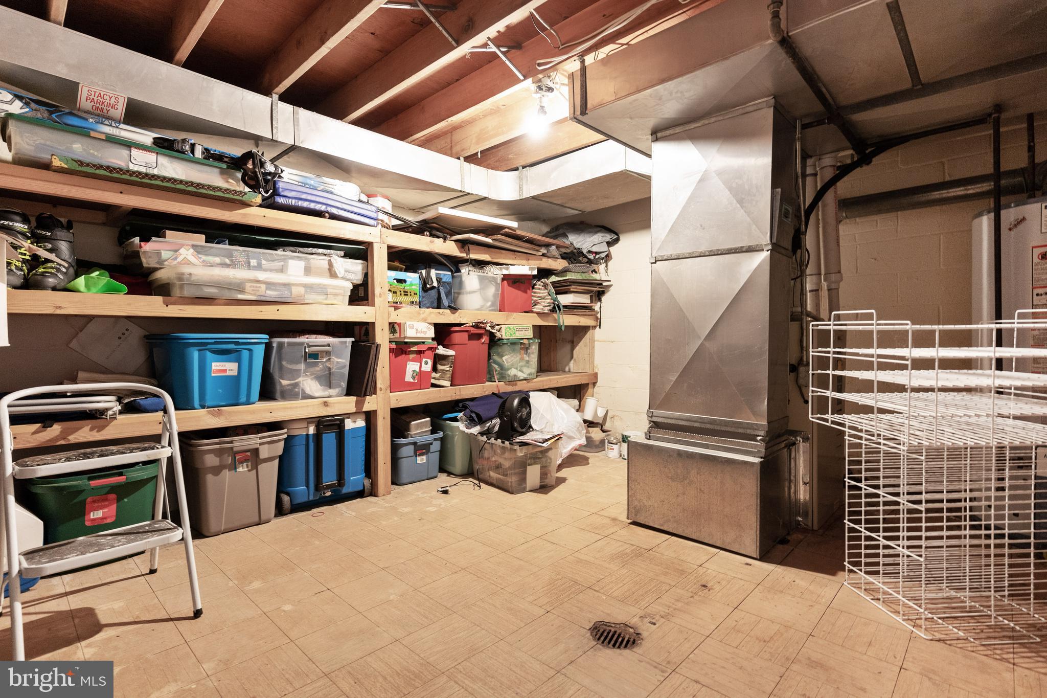 11810 Milbern Drive Potomac, MD 20854 - Photo 32 of 36 Utility Room with lots of shelving