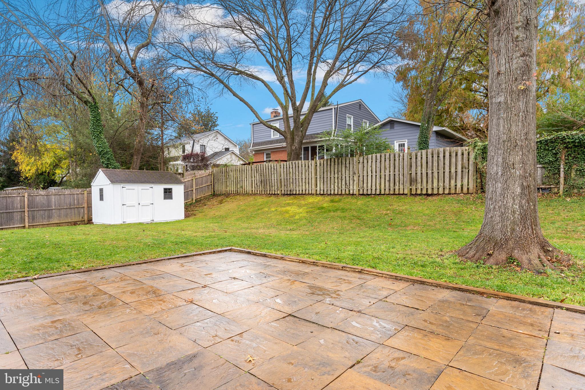 11810 Milbern Drive Potomac, MD 20854 - Photo 34 of 36 Fully fenced backyard with storage shed