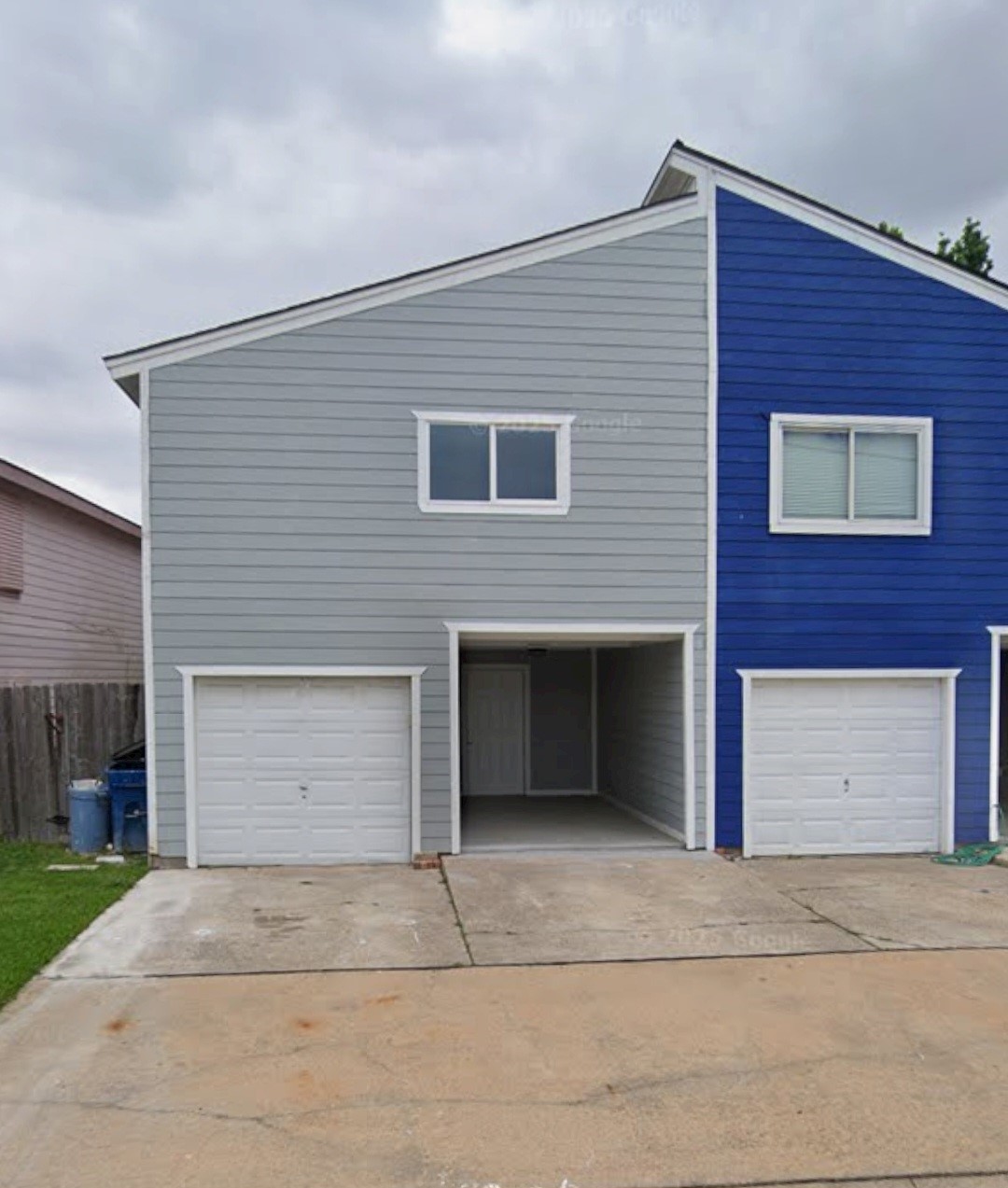 811 Knights Bridge Lane, Unit A Webster, TX 77058 - Photo 1 of 11 a front view of a house with a yard and garage