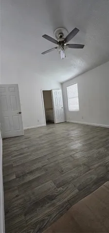 a view of room and wooden floor