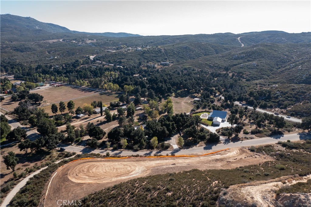47066 Twin Pines Road Banning, CA 92220 - Photo 15 of 19 an aerial view of residential house and sandy dunes