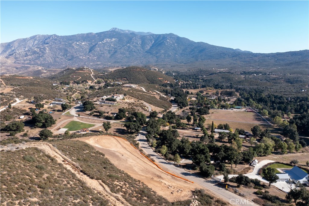 47066 Twin Pines Road Banning, CA 92220 - Photo 16 of 19 an aerial view of residential house and sandy dunes