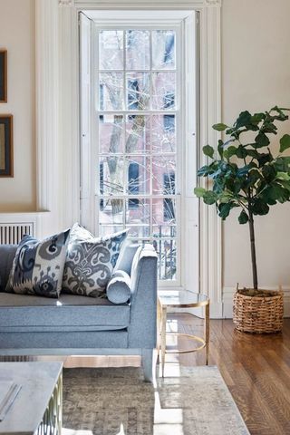a vase of flowers sitting on a table