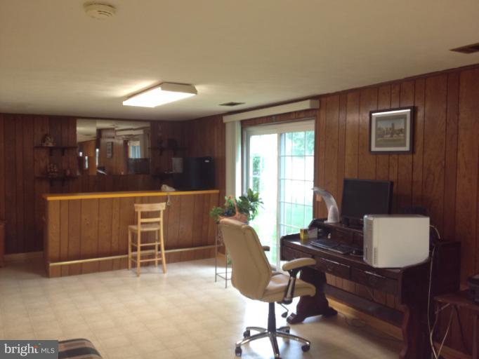 306 Bryanstone Road Reisterstown, MD 21136 - Photo 1 of 21 a view of a workspace with furniture