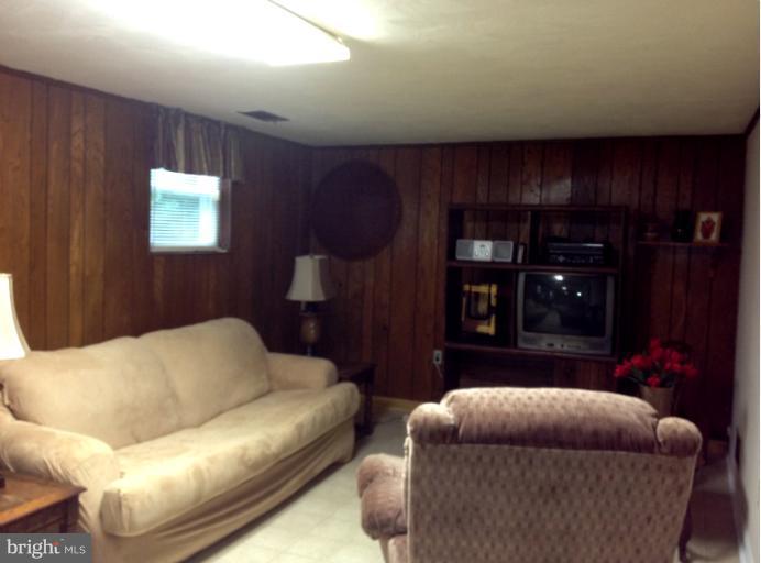 306 Bryanstone Road Reisterstown, MD 21136 - Photo 15 of 21 a living room with furniture and window