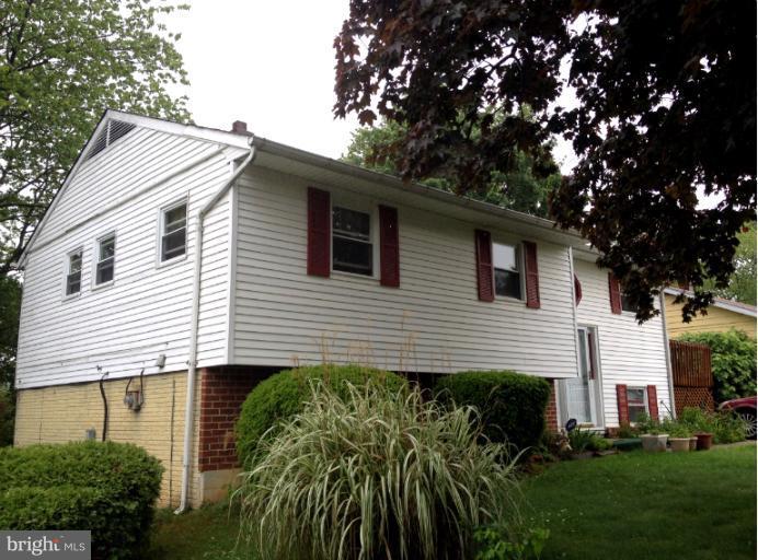 306 Bryanstone Road Reisterstown, MD 21136 - Photo 16 of 21 a view of a house with a yard