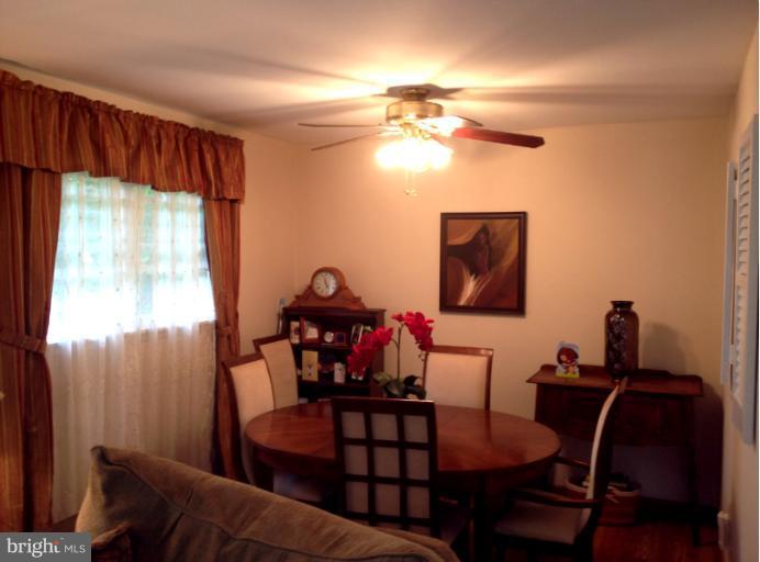 306 Bryanstone Road Reisterstown, MD 21136 - Photo 17 of 21 a view of a dining room with furniture window and outside view