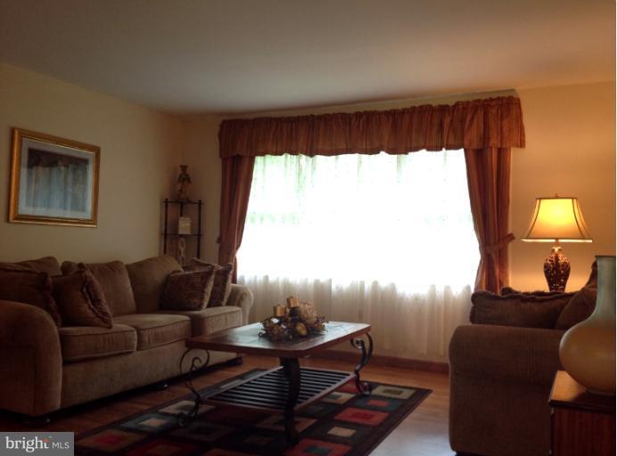 306 Bryanstone Road Reisterstown, MD 21136 - Photo 4 of 21 a living room with furniture and a large window