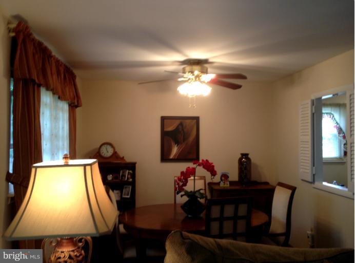 306 Bryanstone Road Reisterstown, MD 21136 - Photo 5 of 21 a view of a dining room with furniture and chandelier