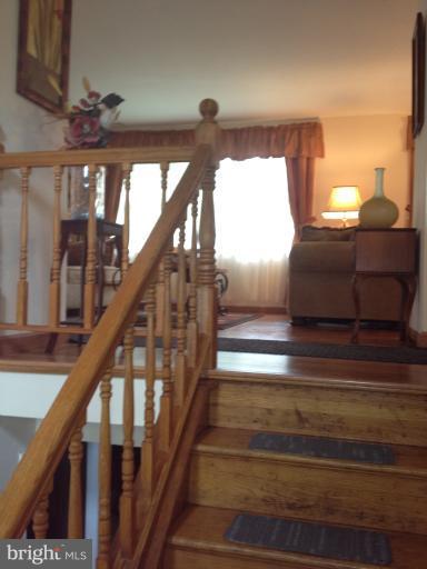 306 Bryanstone Road Reisterstown, MD 21136 - Photo 10 of 21 a view of entryway and hall with wooden floor