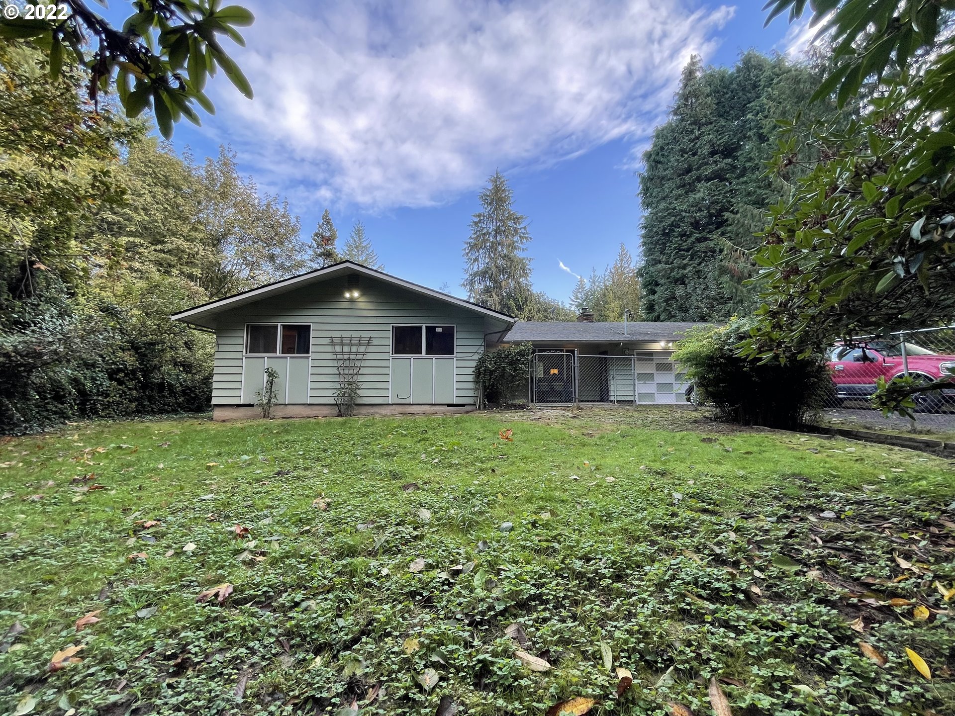 73860 Debast Road Rainier, OR 97048 - Photo 1 of 30 a backyard of a house with lots of green space