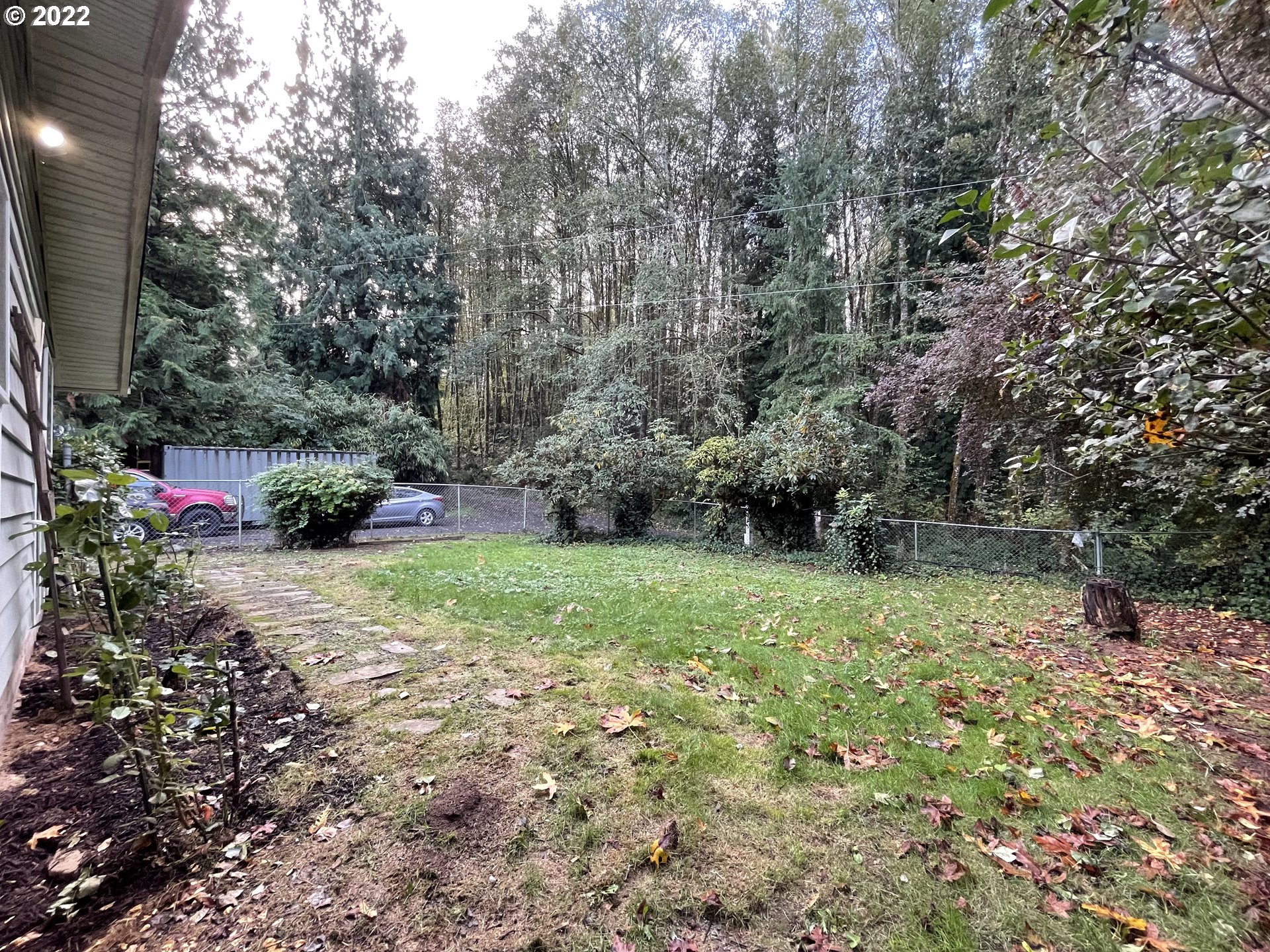 73860 Debast Road Rainier, OR 97048 - Photo 17 of 30 a backyard of a house with lots of green space