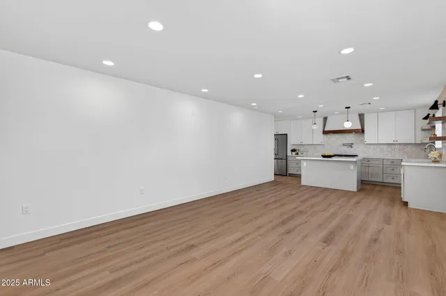 a view of kitchen with wooden floor