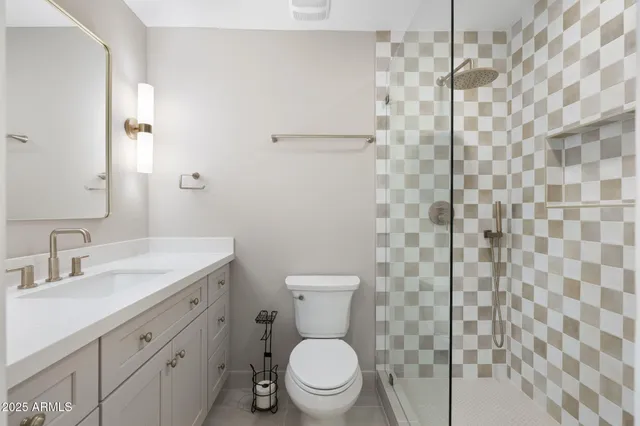 a utility room with sink dryer and washer