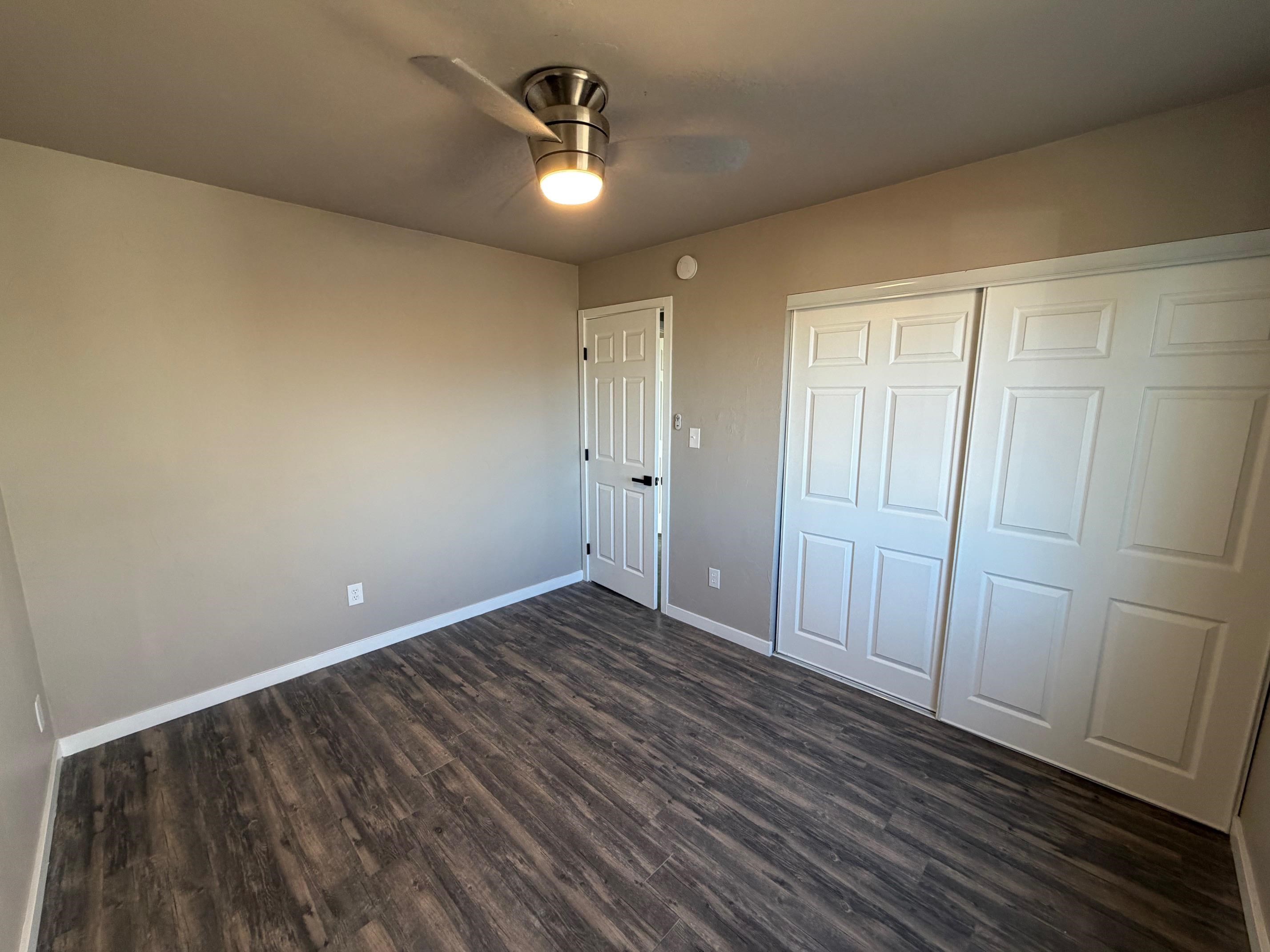 558 1/2 31 3/4 Road Grand Junction, CO 81504 - Photo 13 of 25 wooden floor in an empty room