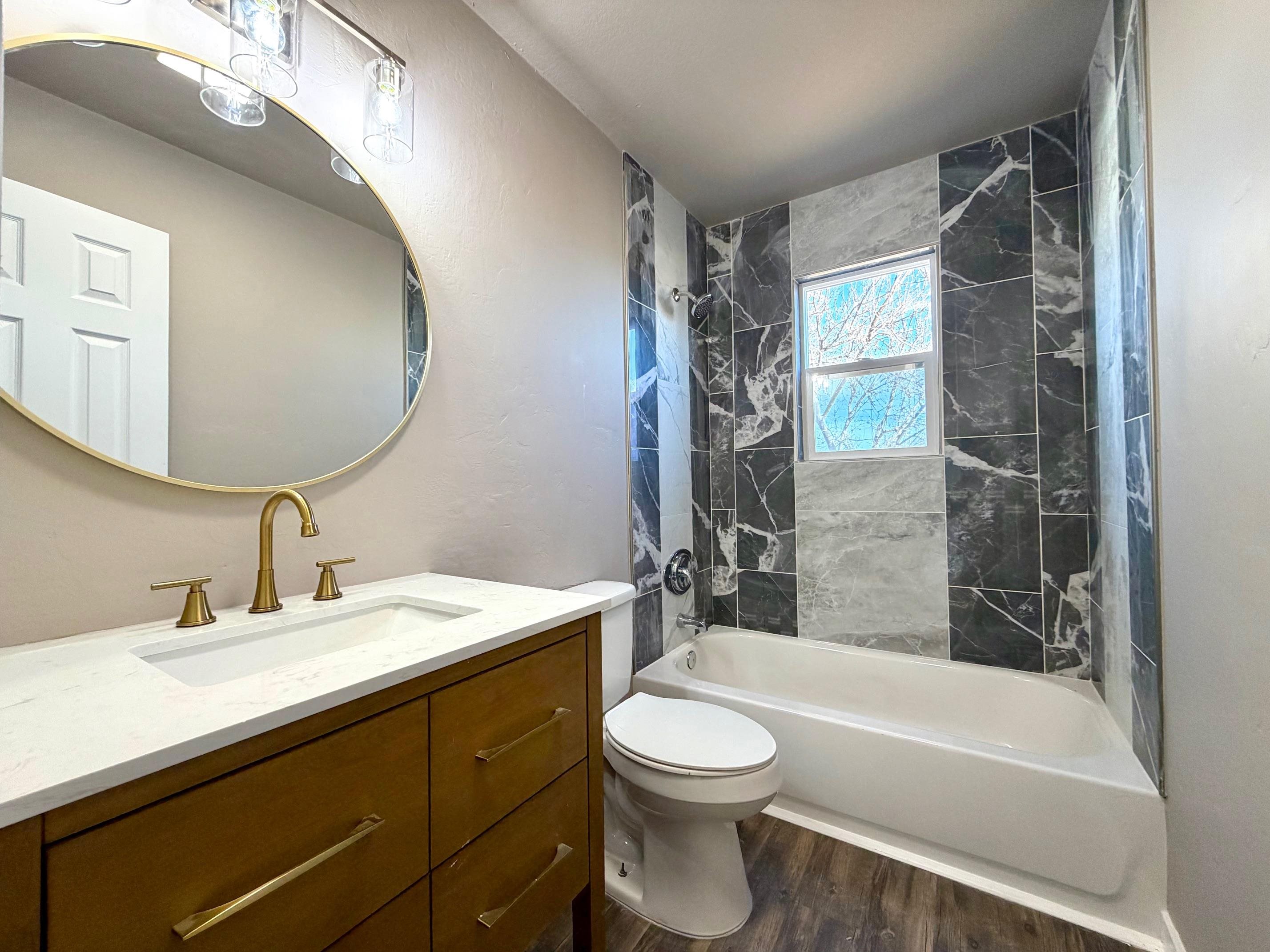 558 1/2 31 3/4 Road Grand Junction, CO 81504 - Photo 17 of 25 a bathroom with a sink a toilet and shower