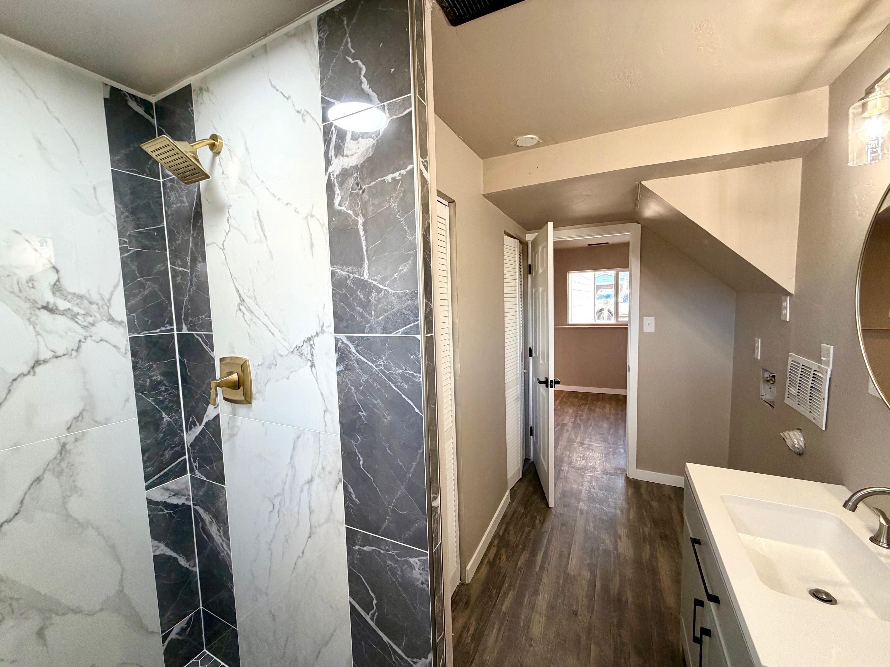 558 1/2 31 3/4 Road Grand Junction, CO 81504 - Photo 22 of 25 a bathroom with a sink and mirror