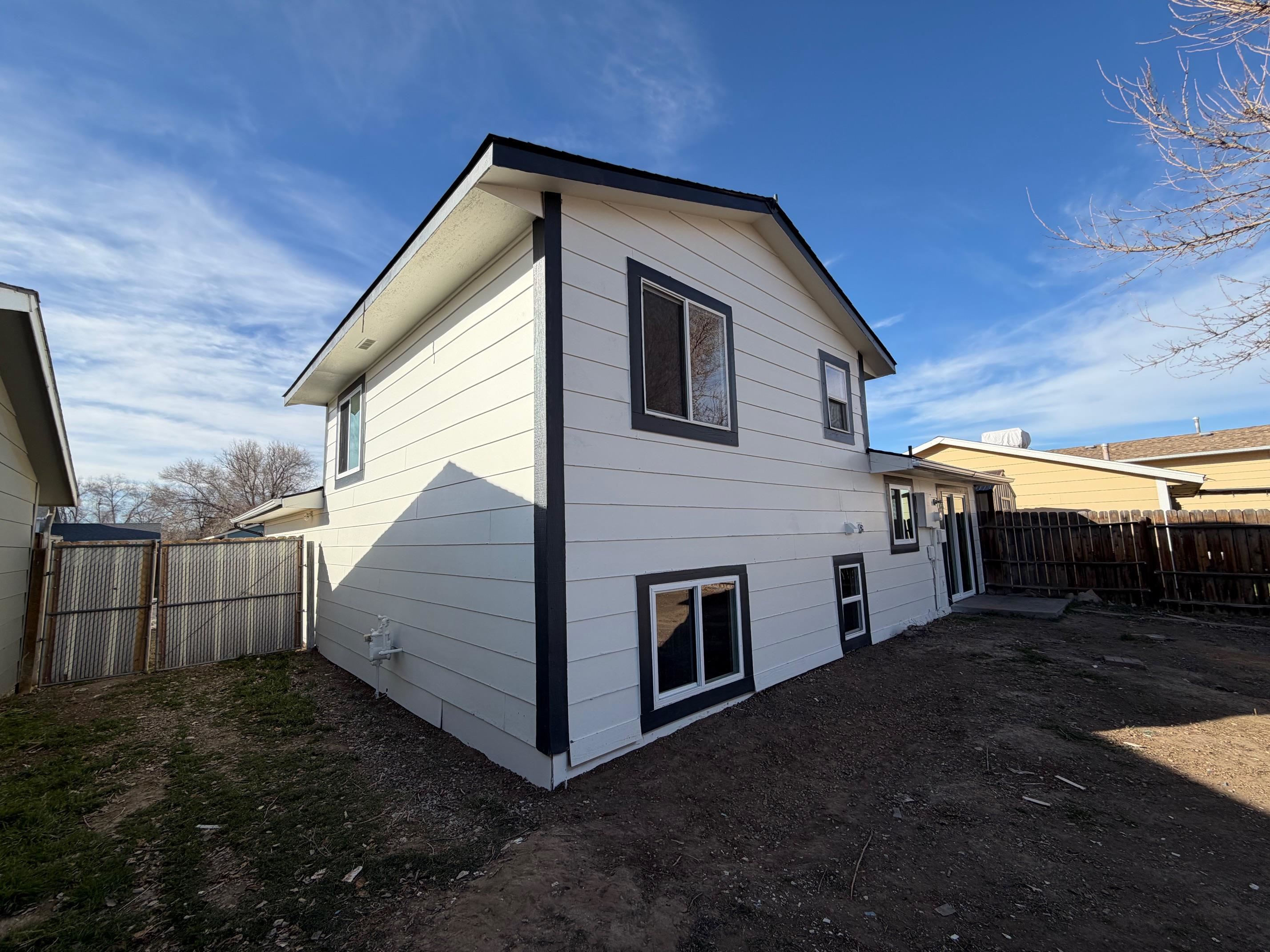558 1/2 31 3/4 Road Grand Junction, CO 81504 - Photo 24 of 25 a view of a house with a yard