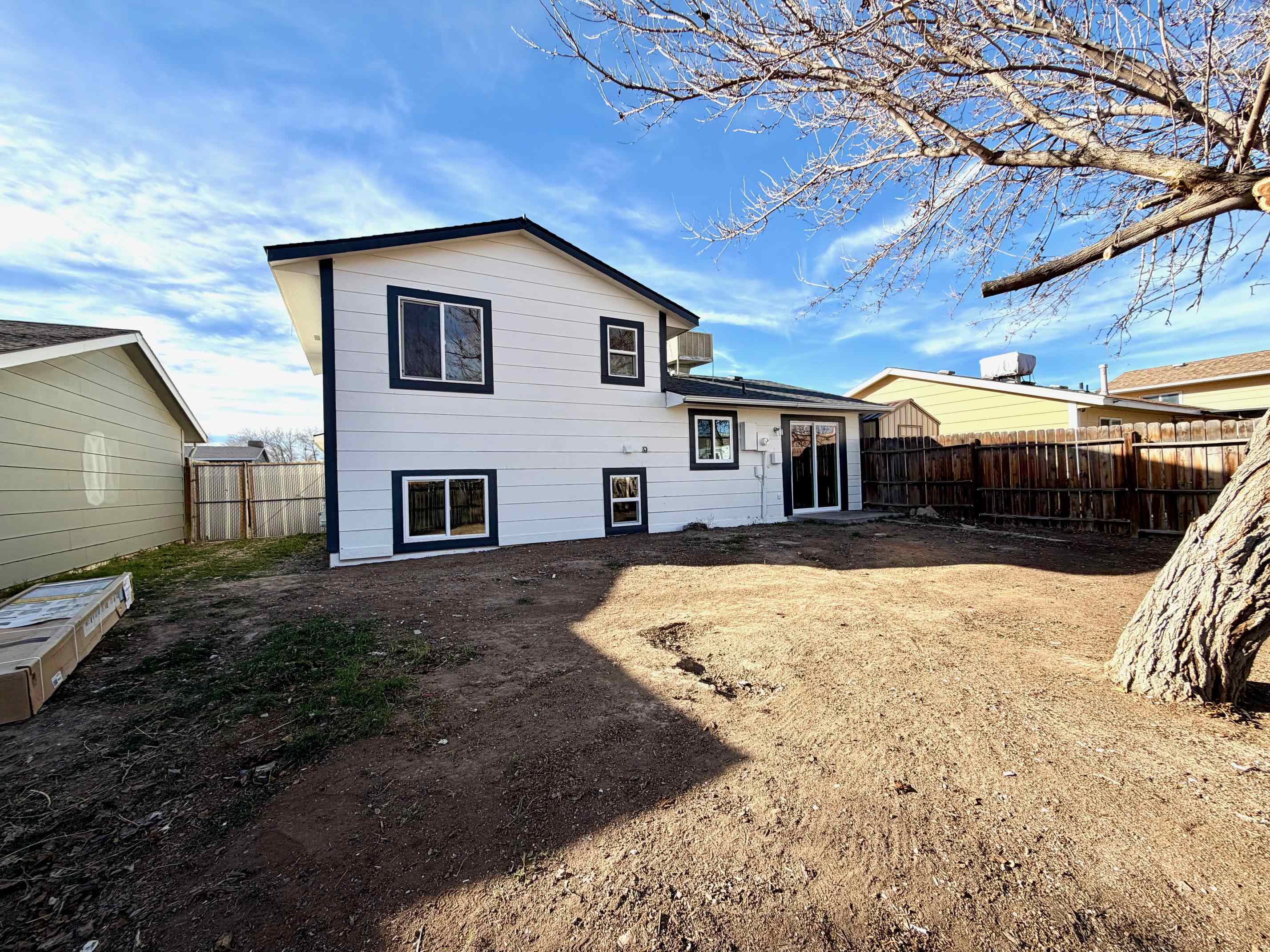 558 1/2 31 3/4 Road Grand Junction, CO 81504 - Photo 25 of 25 a front view of a house with a yard