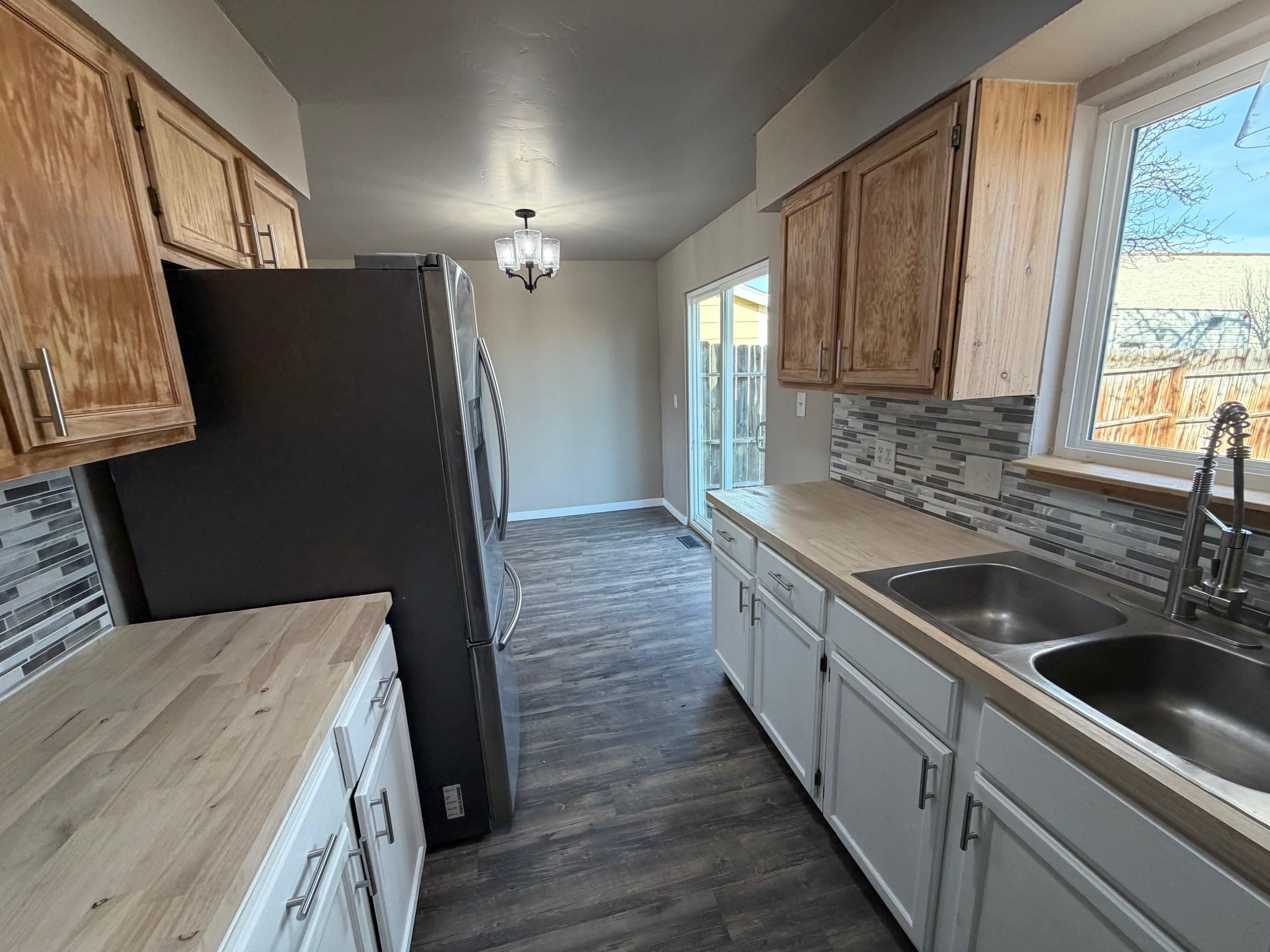 558 1/2 31 3/4 Road Grand Junction, CO 81504 - Photo 10 of 25 a kitchen with a sink stove and refrigerator